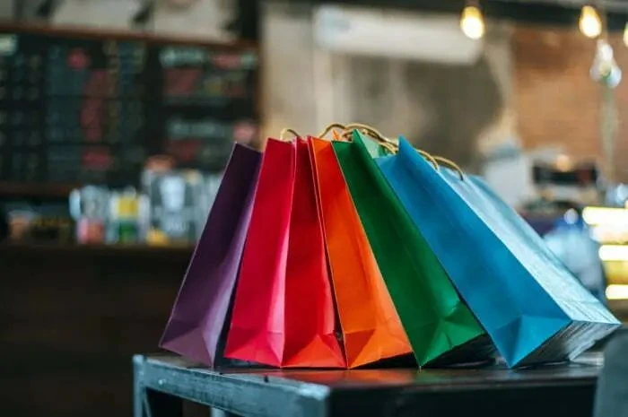 colorful-paper-bags-placed-table-1